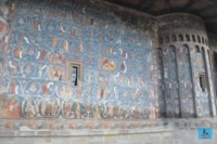 The famous blue of Voronet and the scenes painted on one of the sides